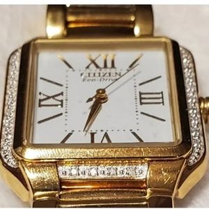 CITIZEN ECO DRIVE GOLD TONE WATCH WITH WHITE GLITTER FACE